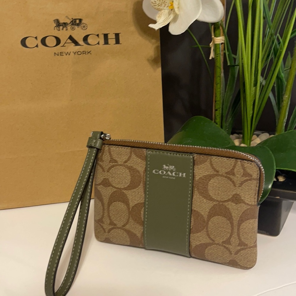 Signature coach wristlet